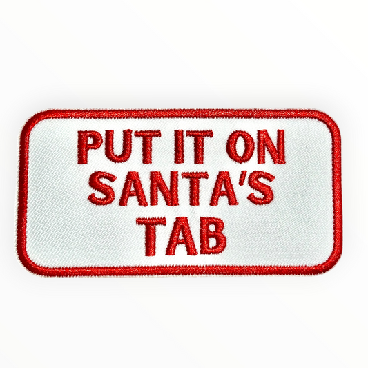 “Put It On Santa’s Tab” Iron On Patch