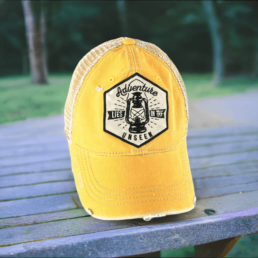 "Adventure Lies In The Unseen" Distressed Trucker Cap (Lantern) - Wander Together Outfitters