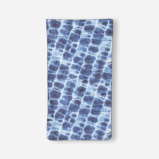 Blue patterned towel on a white background