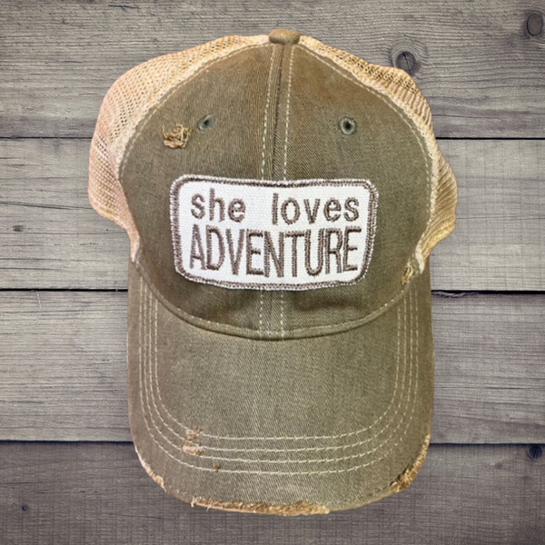 “She Loves Adventure” Distressed Trucker Hat