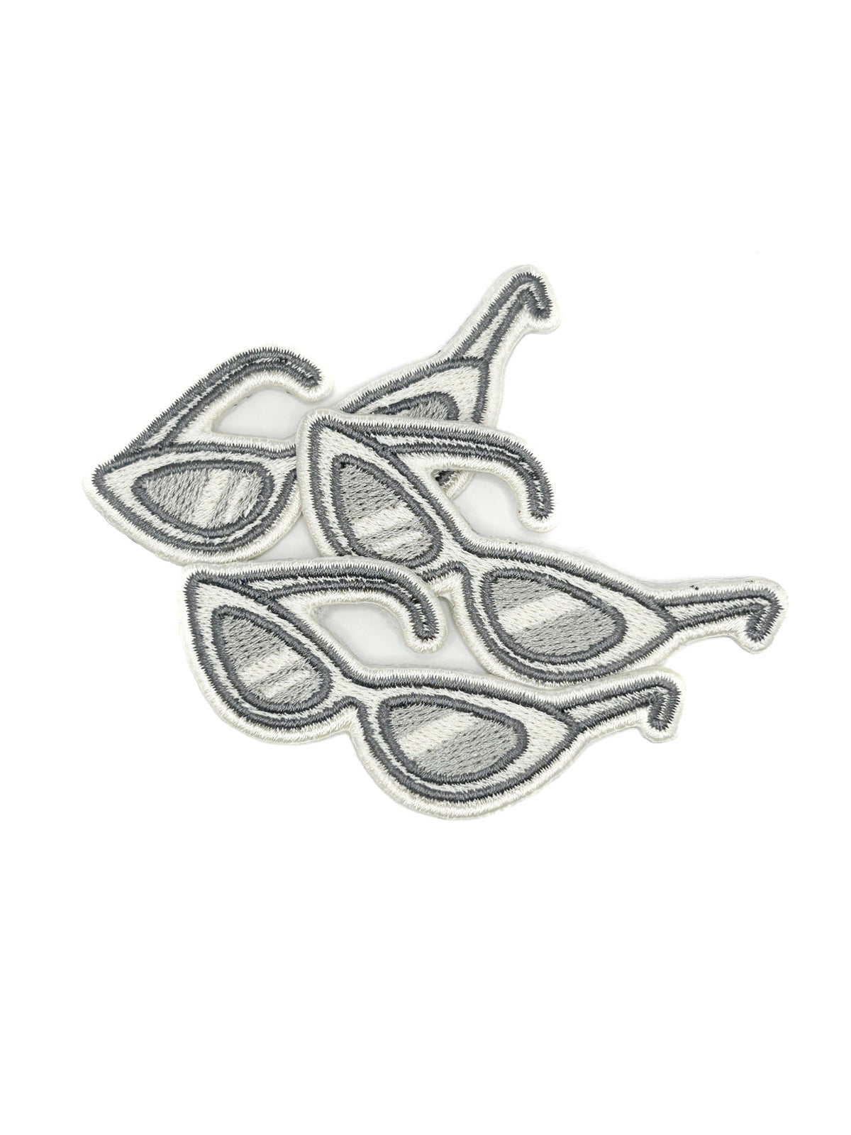 Pair of silver sunglasses on a white background