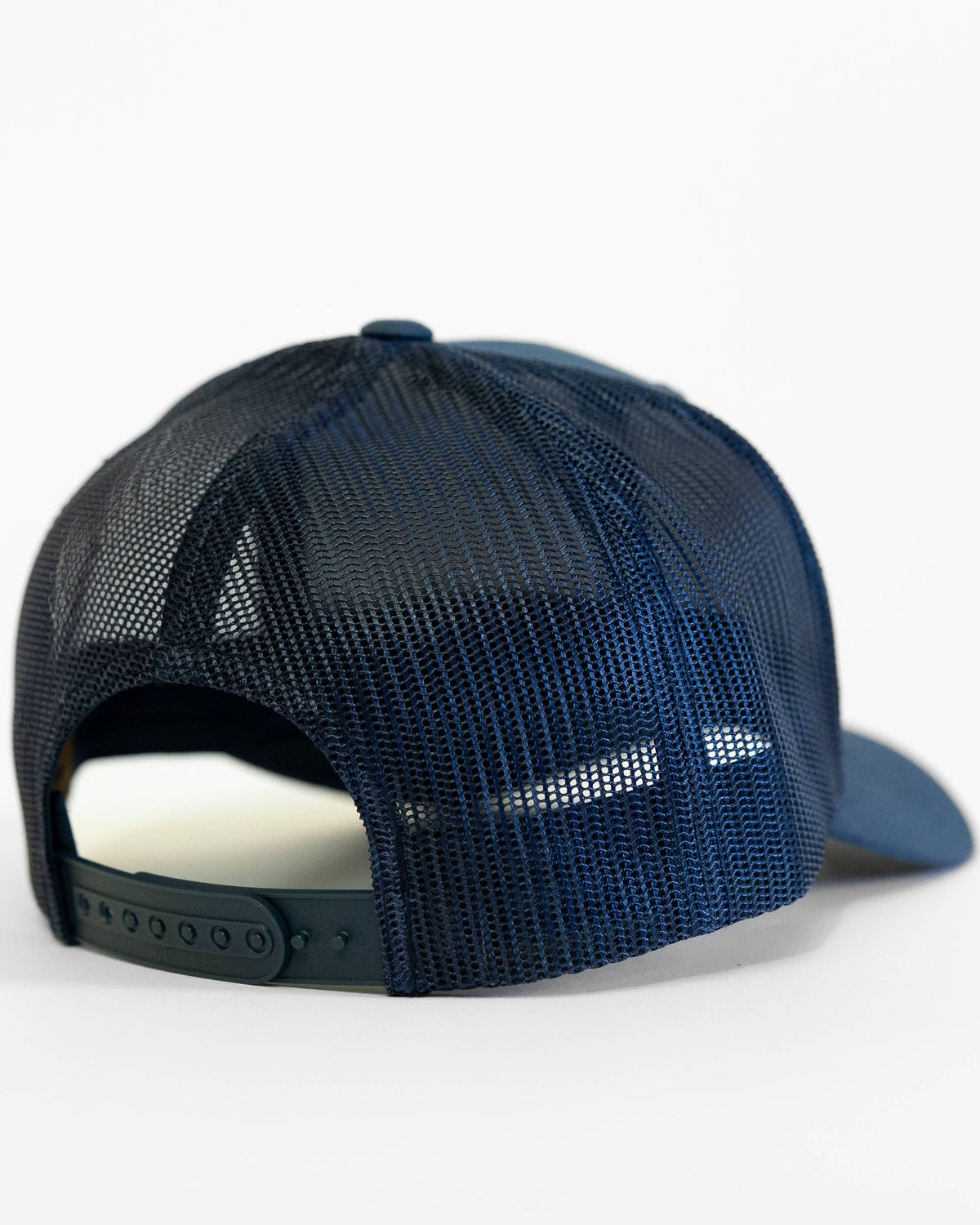 Navy blue mesh cap on a white background