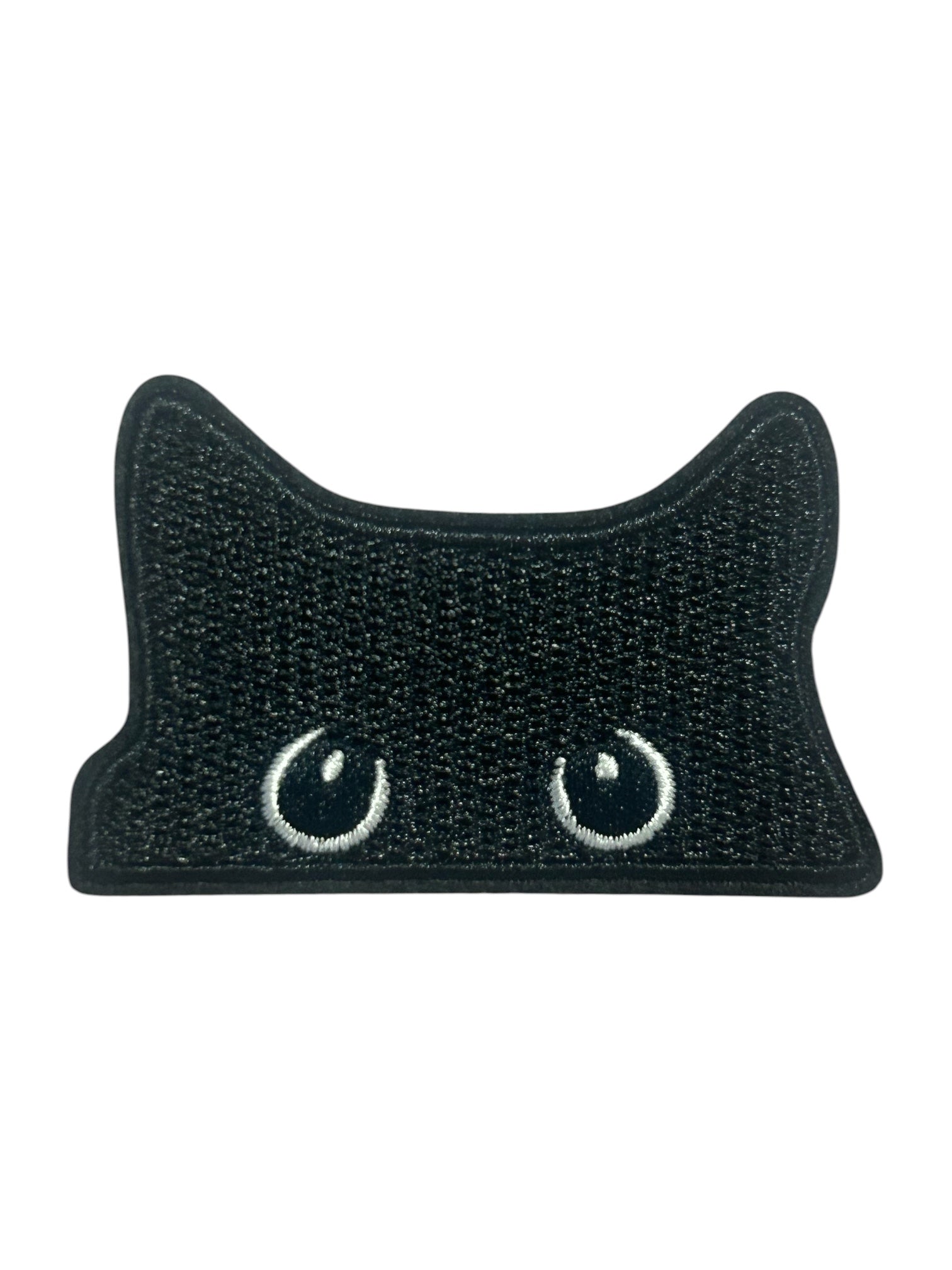 A black cat-shaped patch with embroidered white eyes, shown on a plain white background.