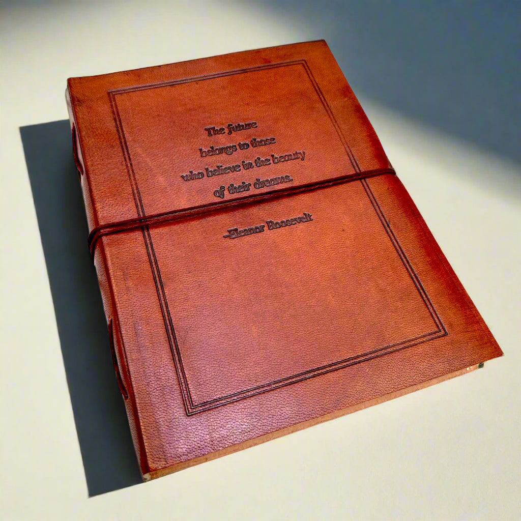 Brown leather-bound book with text on a light background