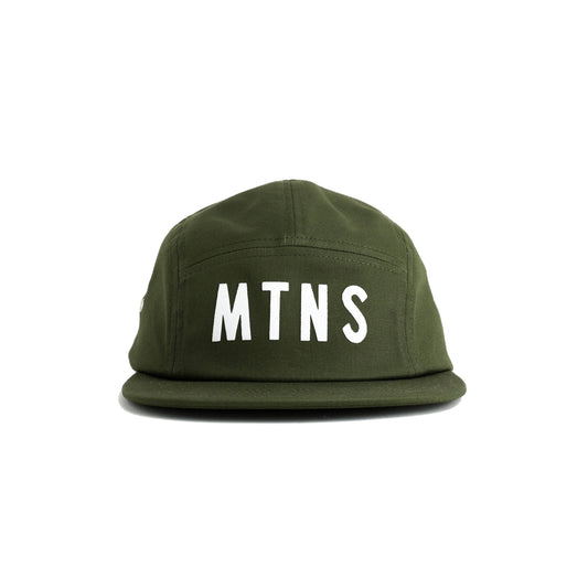 An olive green five-panel cap with 'MTNS' printed in bold white letters on the front, set against a plain white background.