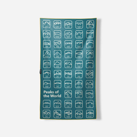 Teal towel with mountain icons and 'Peaks of the World' text on a white background
