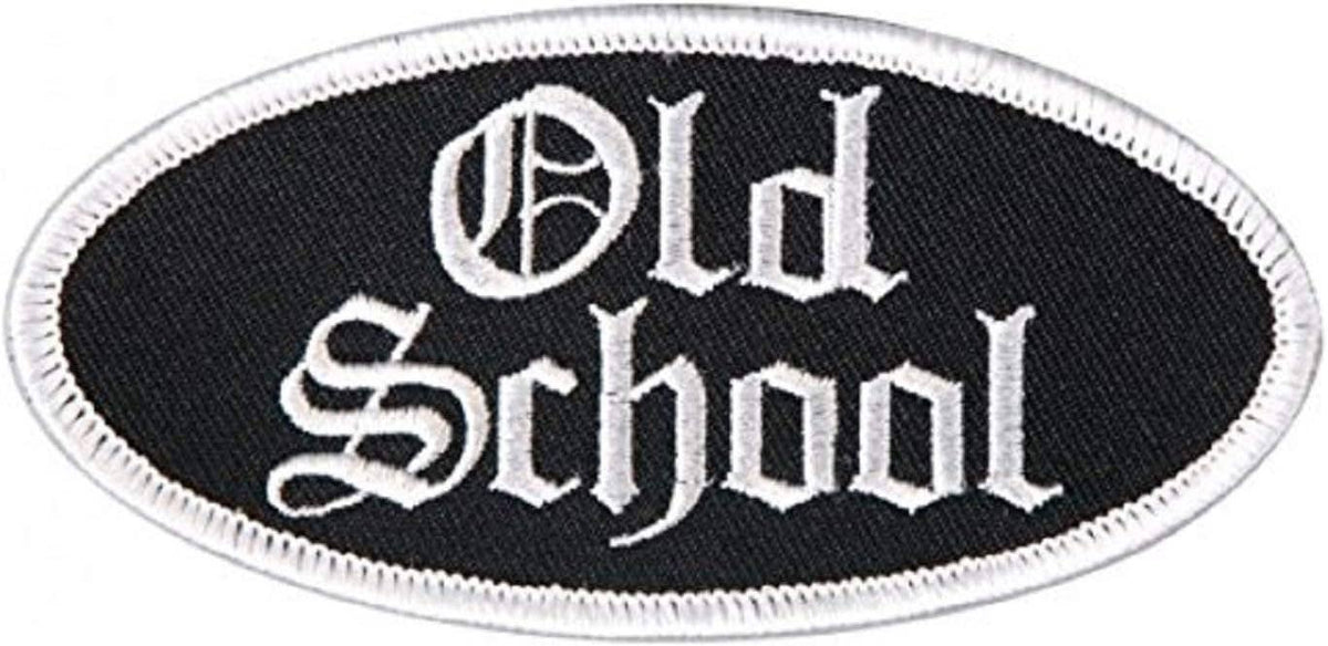 An oval embroidered patch with a black background and white gothic-style lettering that reads 'Old School' on a white background.