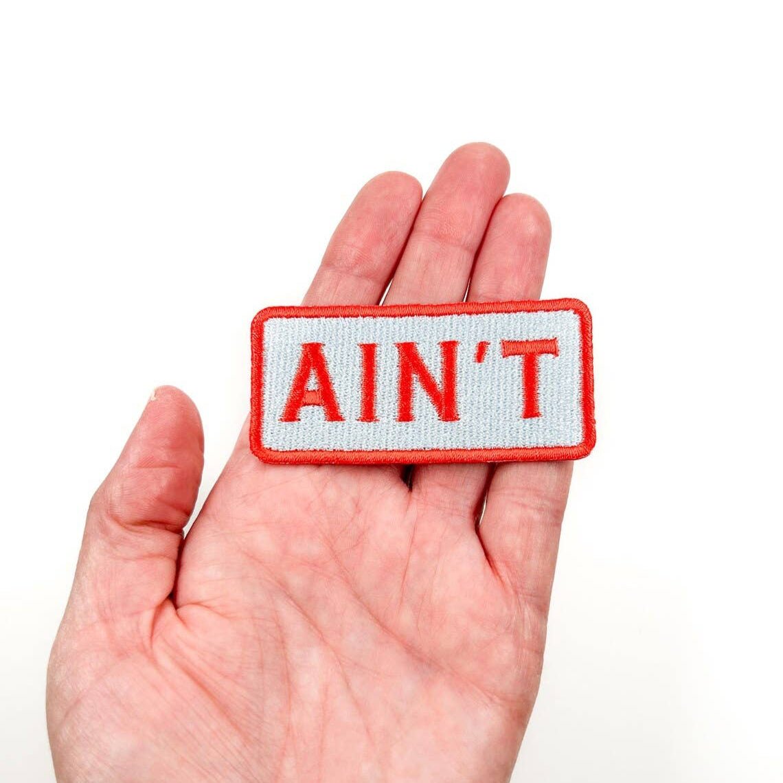 "Ain't" Embroidered Iron - on Patch Western - Wander Together Outfitters