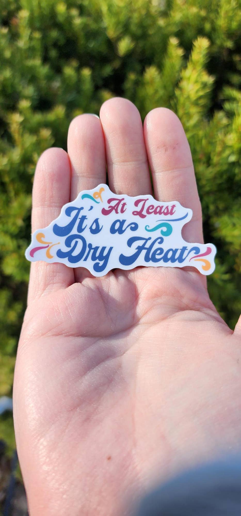 "At Least It's A Dry Heat" Vinyl Sticker 3" Wide - Wander Together Outfitters