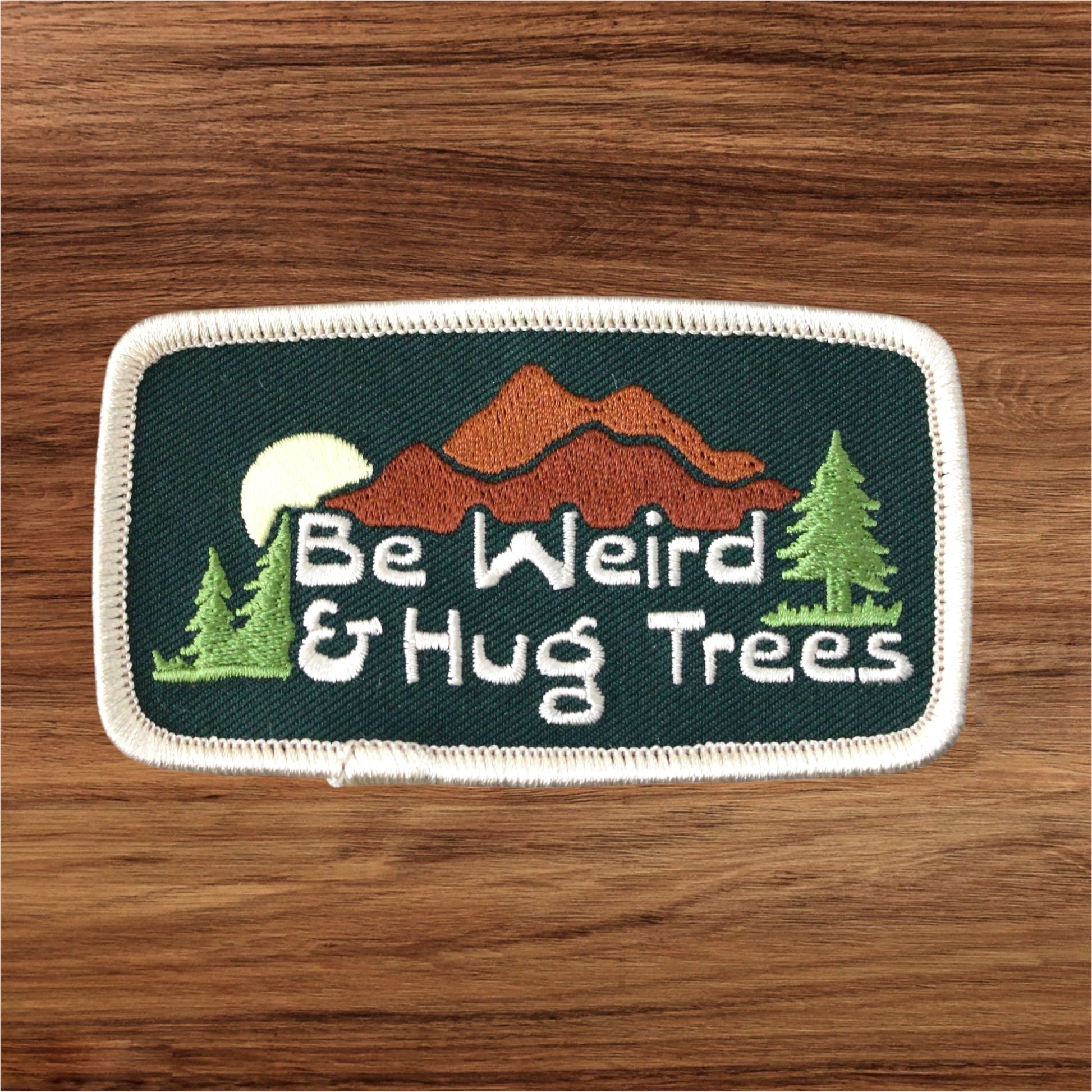 “Be Weird and Hug Trees” Embroidered Iron On Patch - Wander Together Outfitters