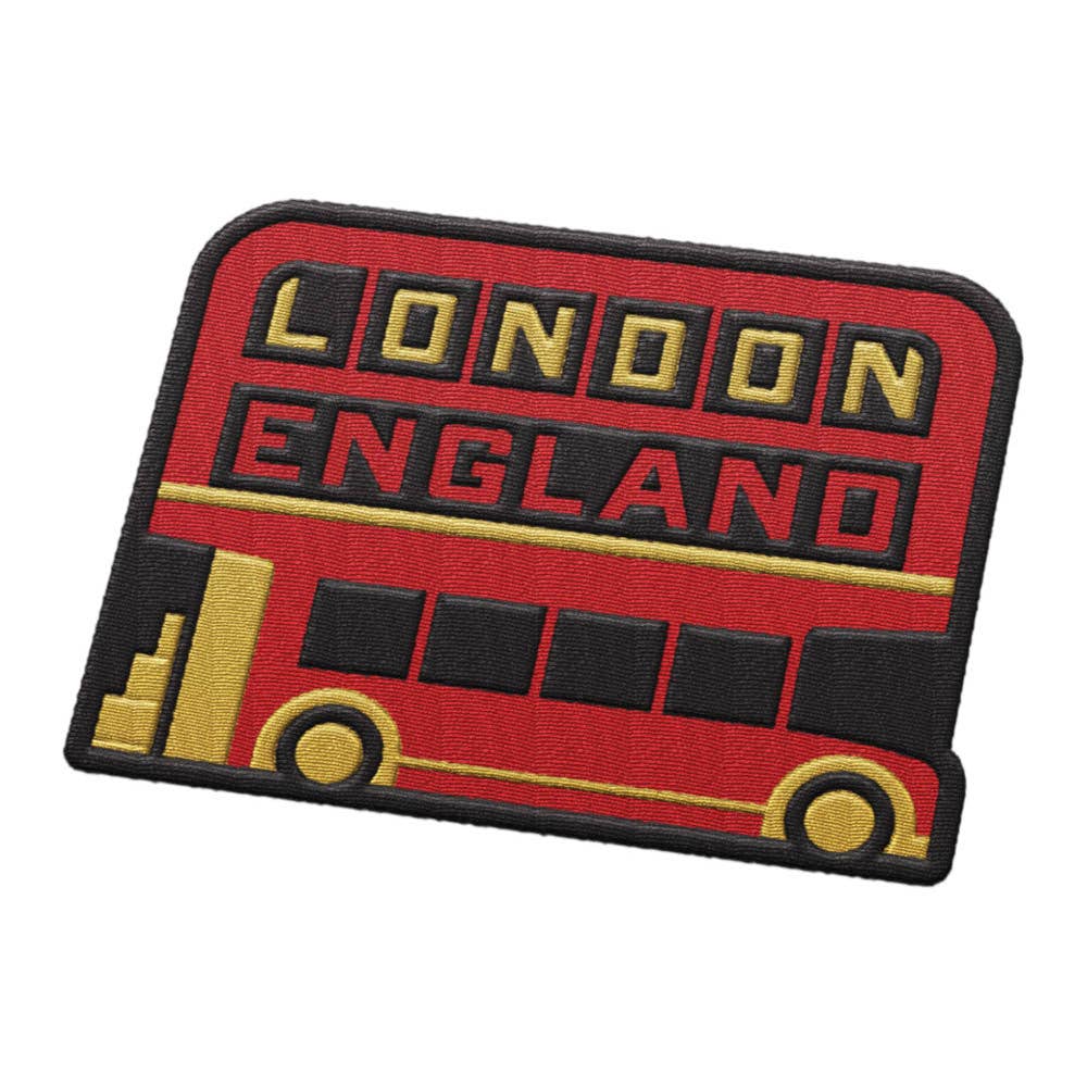 An embroidered patch shaped like a red double-decker bus with the words 'LONDON ENGLAND' in gold and black lettering, shown on a plain white background.