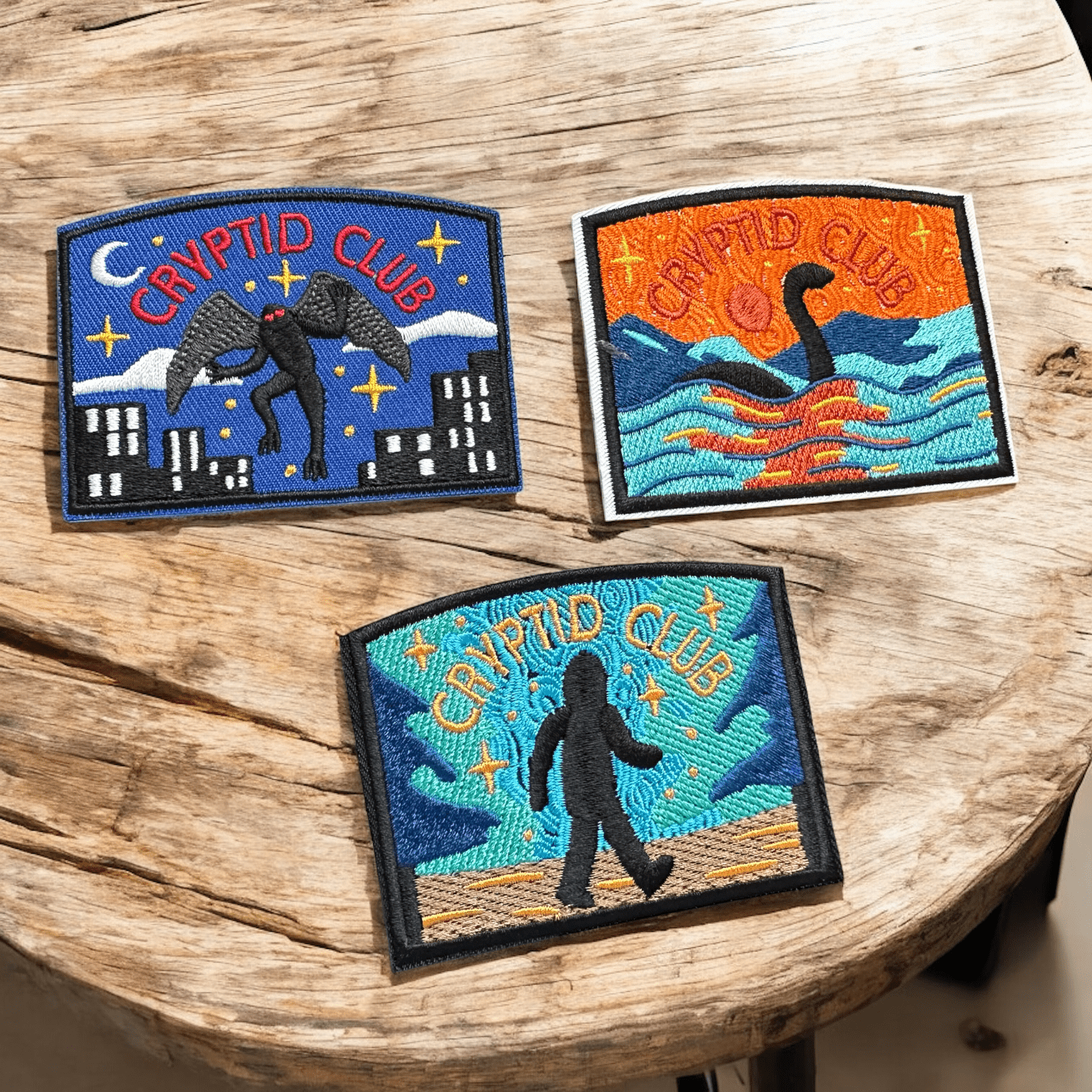 Cryptid Club Bigfoot and Loch Ness, Mothman Iron On Patches - Wander Together Outfitters
