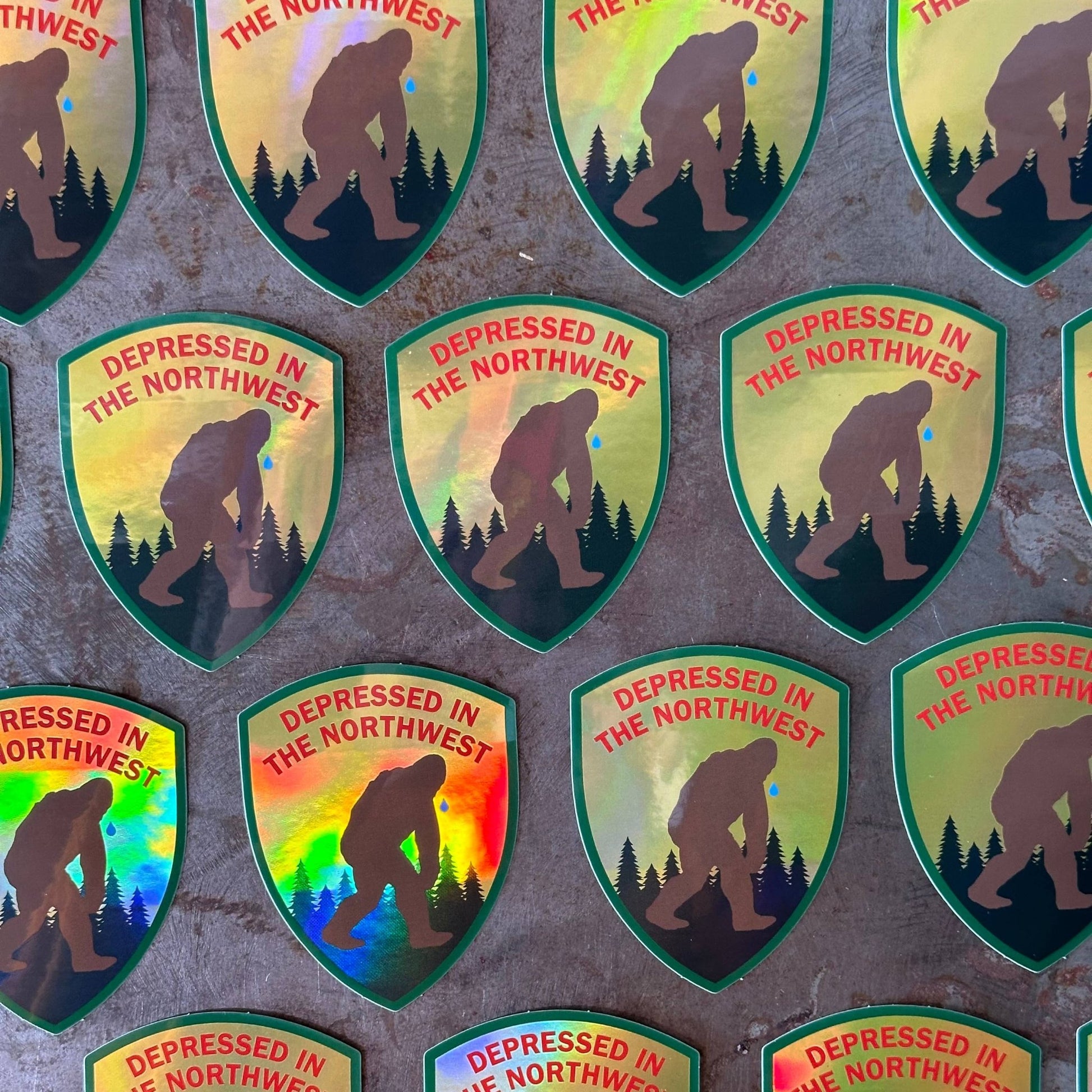 "Depressed In The Northwest" Broken Hearted Bigfoot Holographic Sticker - Wander Together Outfitters