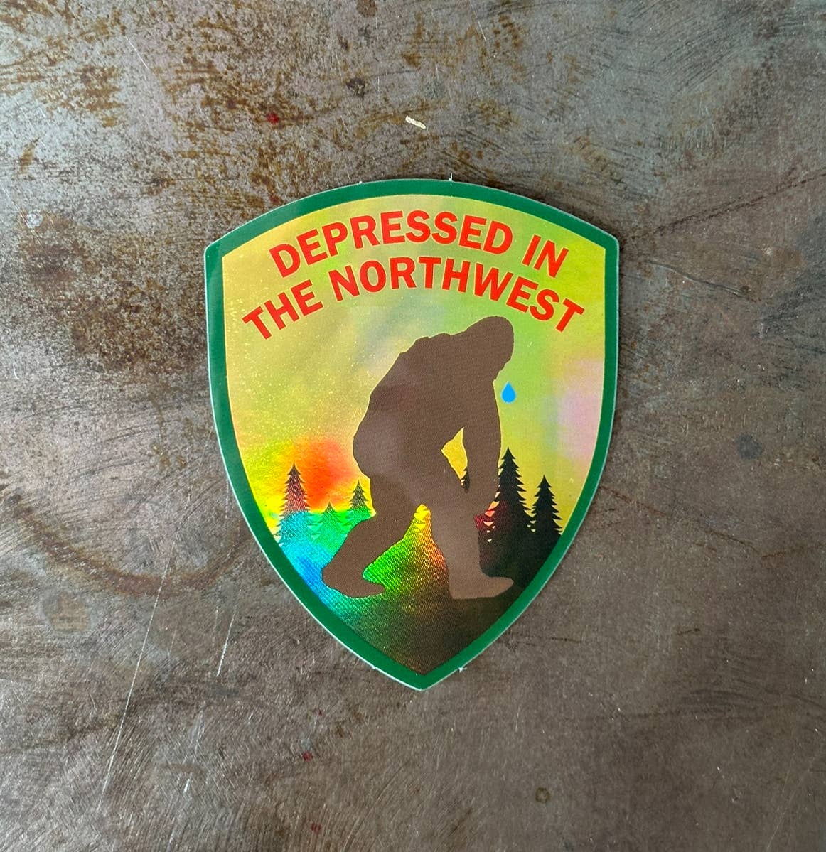 "Depressed In The Northwest" Broken Hearted Bigfoot Holographic Sticker - Wander Together Outfitters
