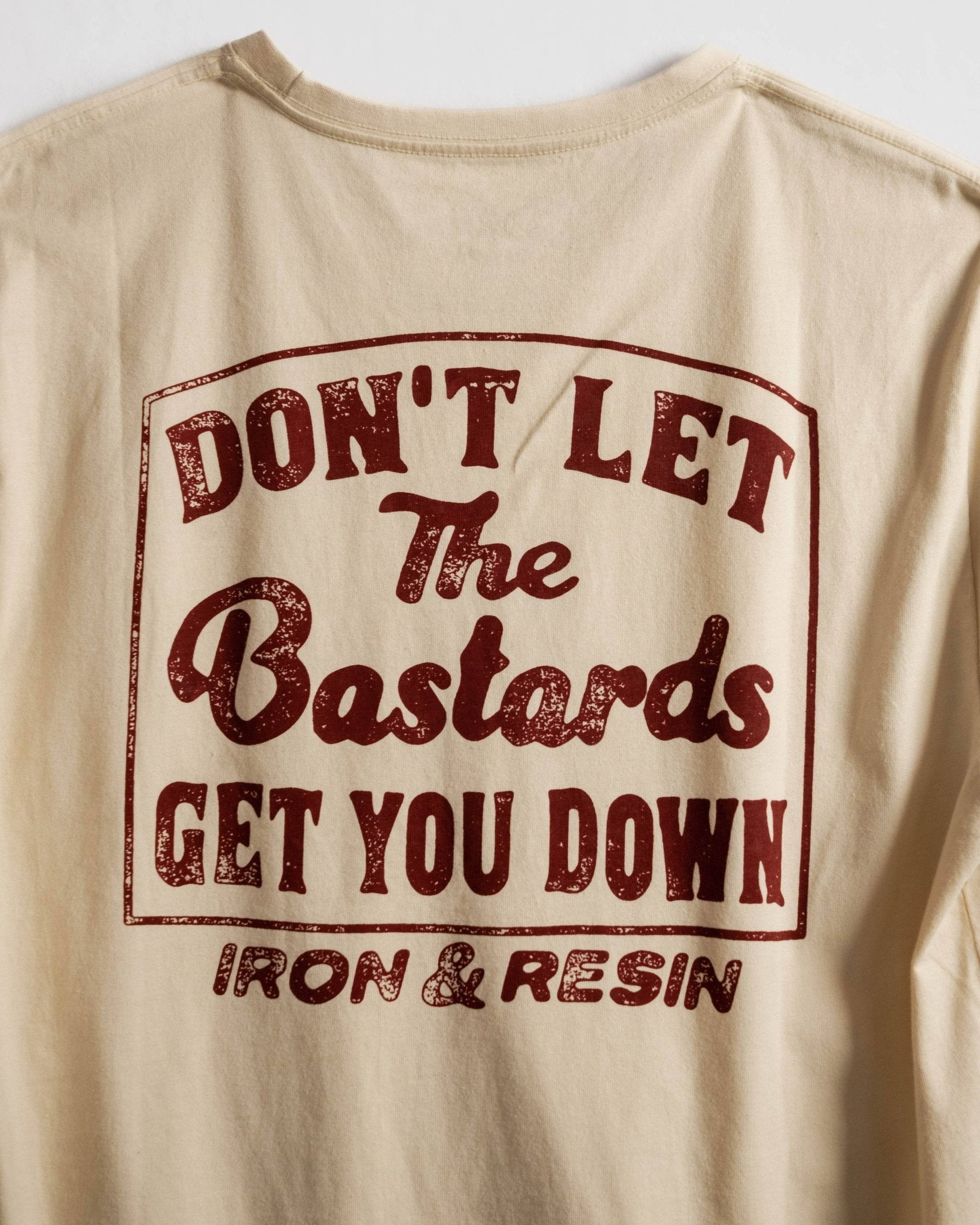 'Don't Let The Bastards Get You Down' Badge Tee - Wander Together Outfitters
