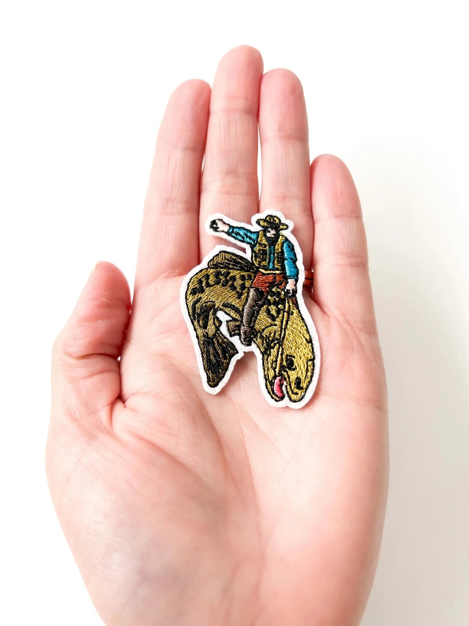 Fishing Cowboy Riding Bucking Trout Embroidered Iron On Patch - Wander Together Outfitters