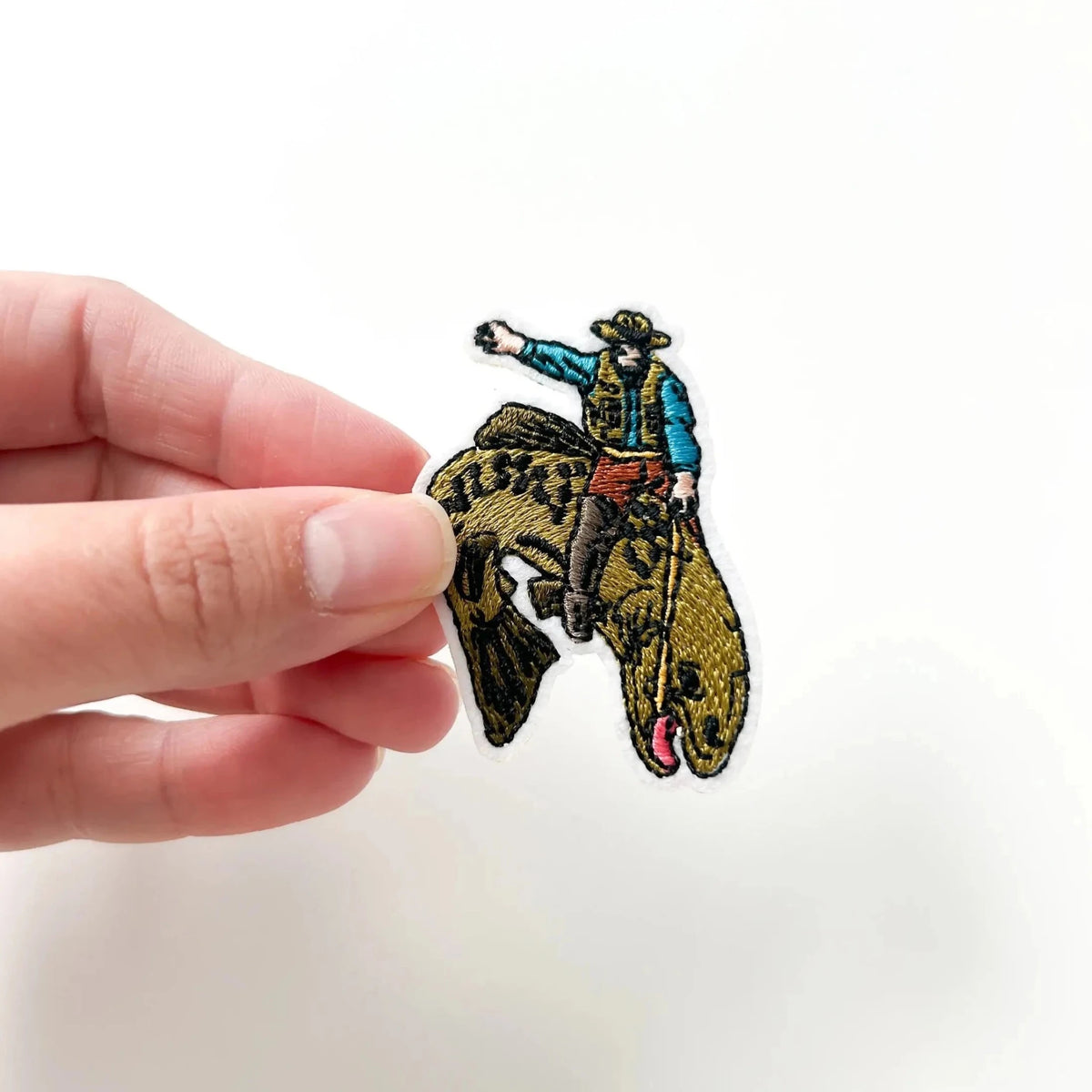 Fishing Cowboy Riding Bucking Trout Embroidered Iron On Patch - Wander Together Outfitters