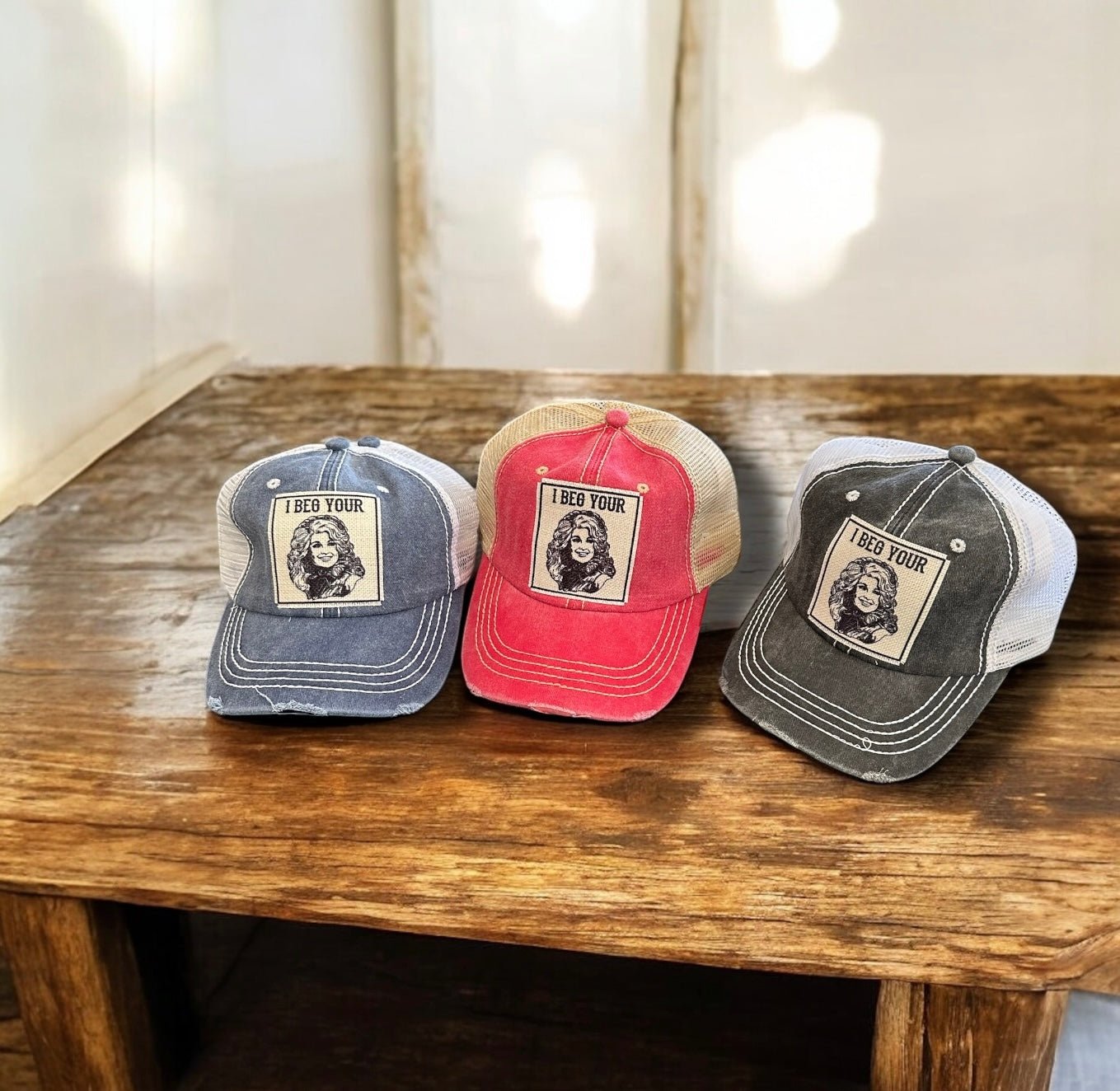 "I Beg Your (Parton)" Dolly Distressed Trucker Caps - Wander Together Outfitters