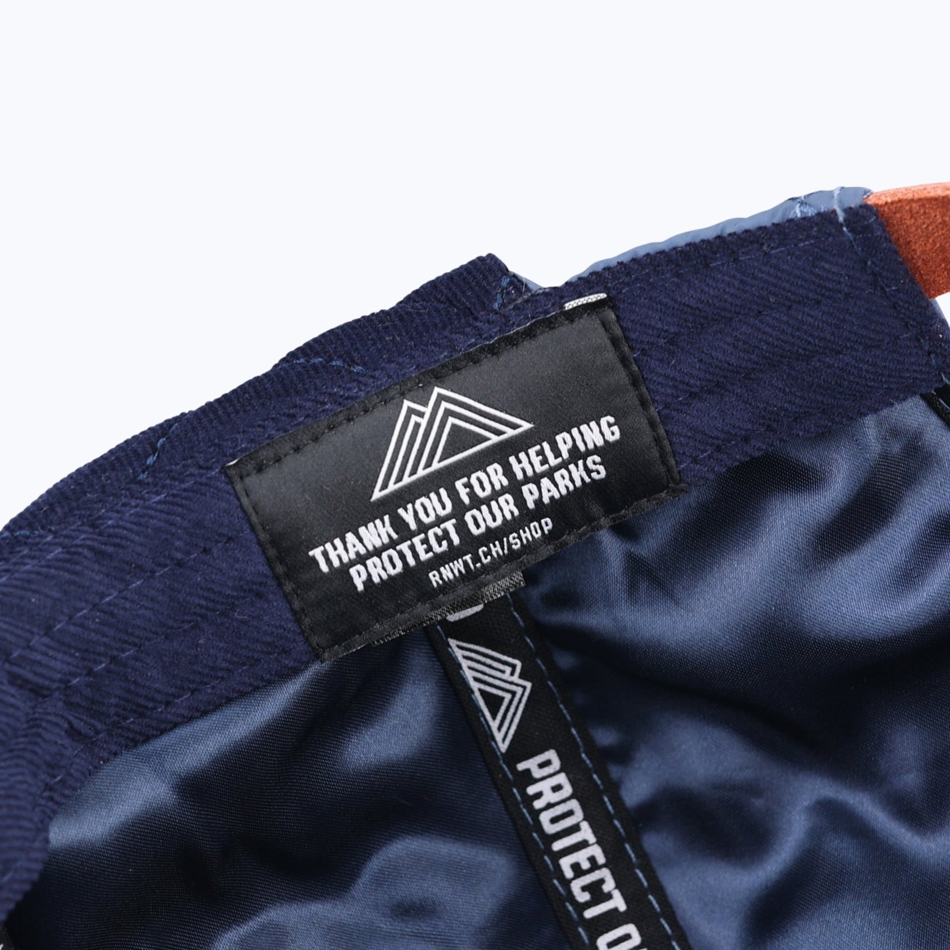 "Protect Our Parks" Bear 7 Panel Quilted Trapper Outdoor Cap - Navy/Orange - Wander Together Outfitters