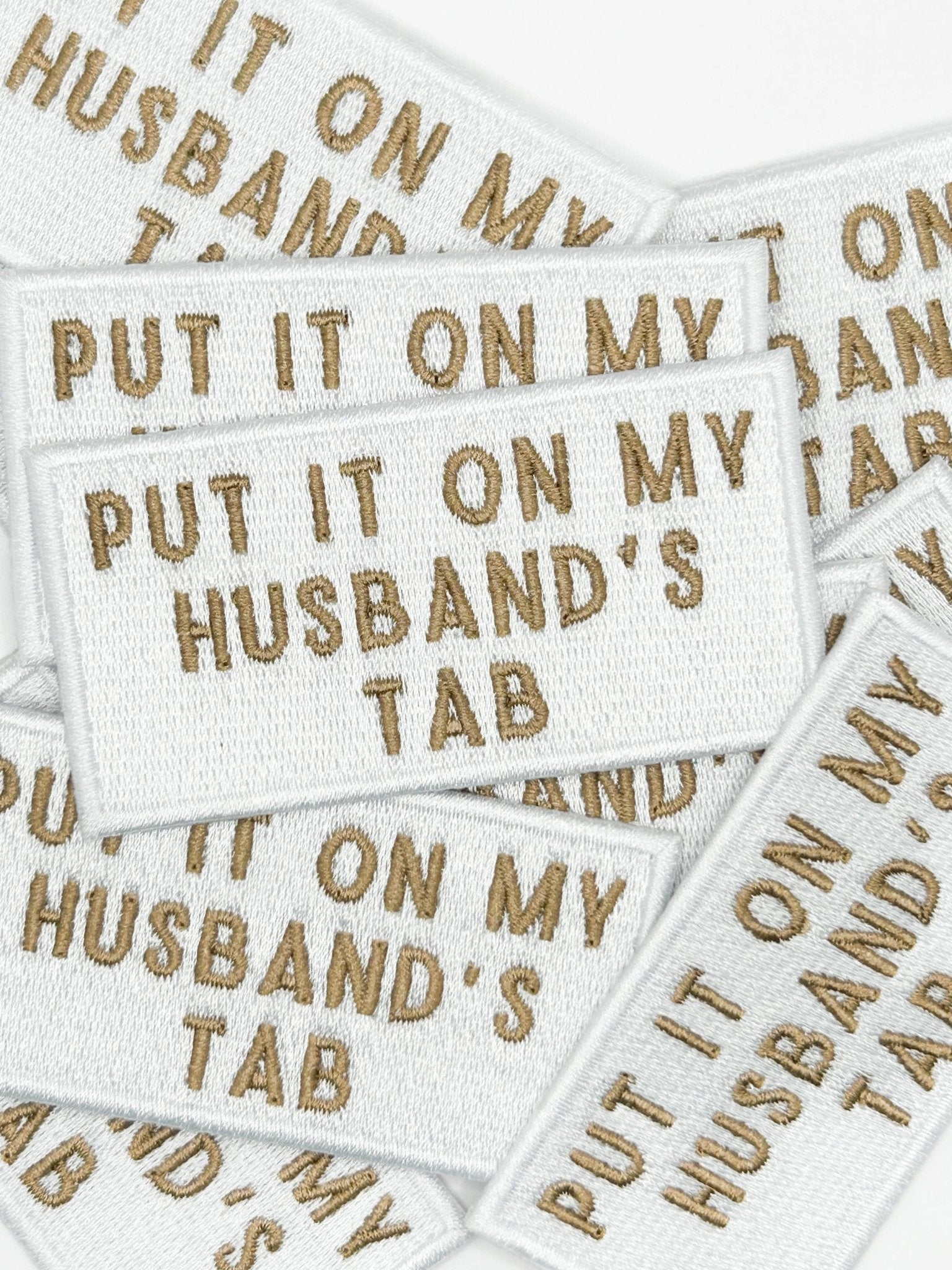 "Put It On My Husband's Tab" Iron - On Patch (Beige or Pink) - Wander Together Outfitters