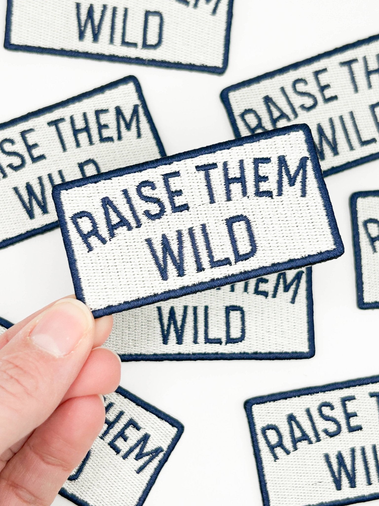 "Raise Them Wild" Embroidered Iron On Patch - Wander Together Outfitters