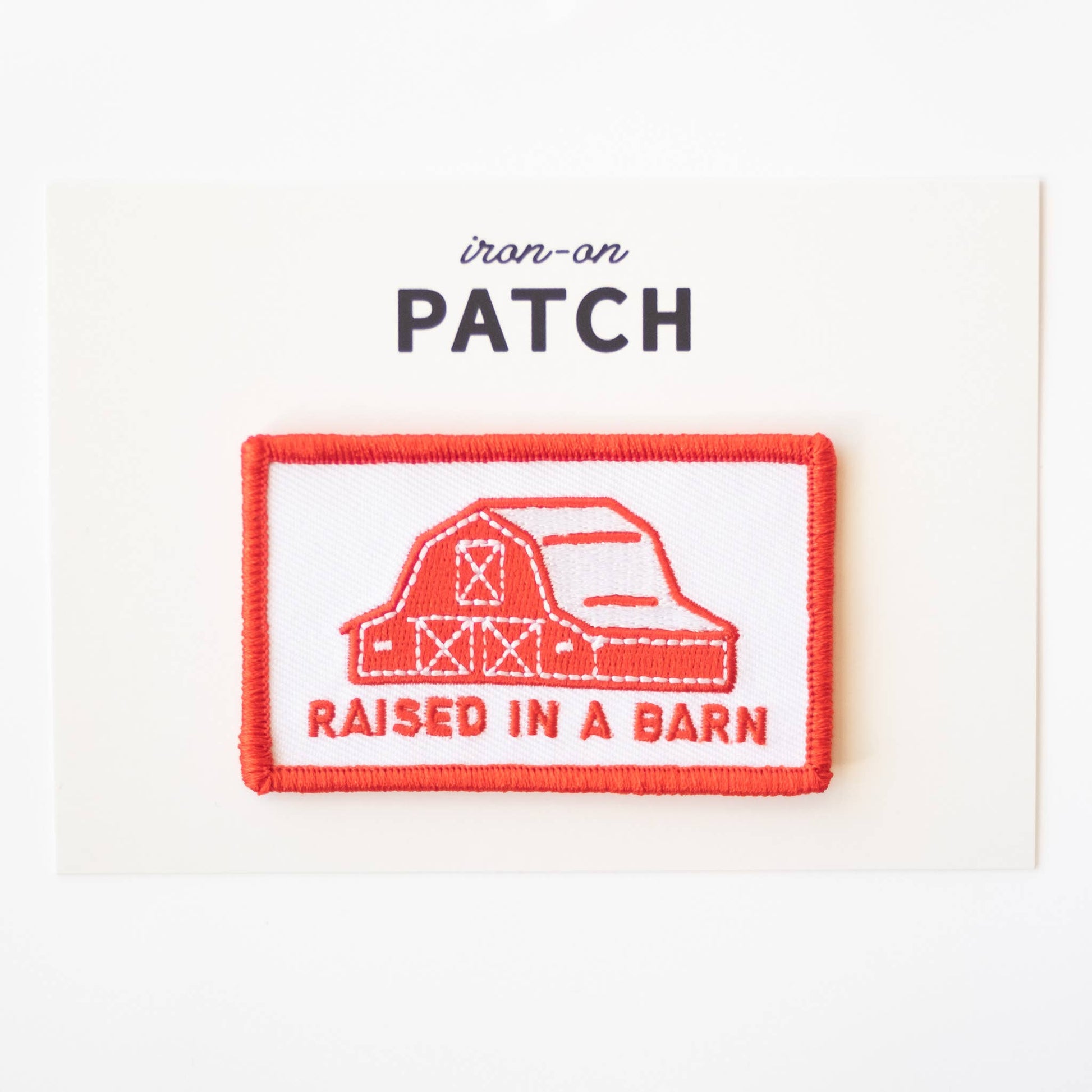 “Raised In A Barn” Embroidered Iron on Patch - Wander Together Outfitters