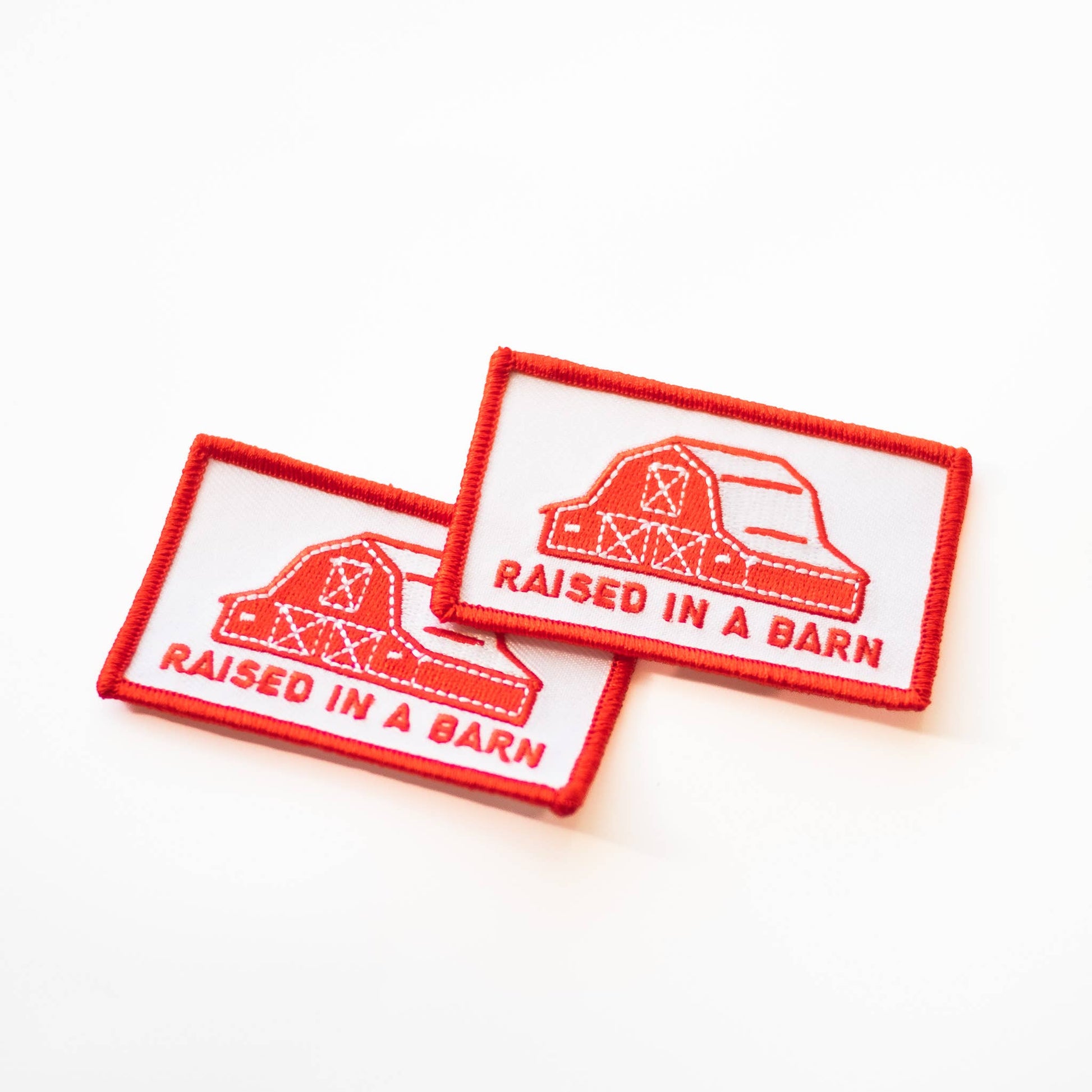 “Raised In A Barn” Embroidered Iron on Patch - Wander Together Outfitters