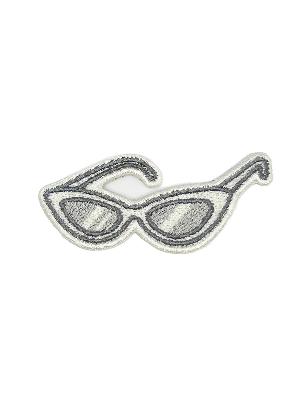 Sunglasses patch with dark lenses on a white background