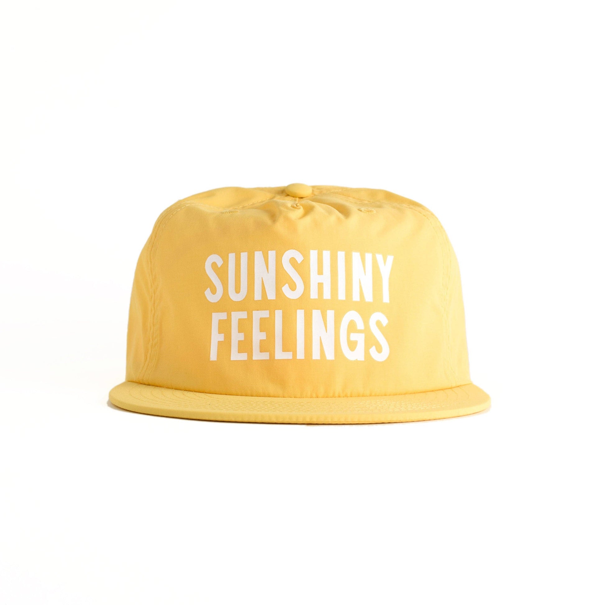 Yellow bucket hat with 'SUNSHINY FEELINGS' text on a white background