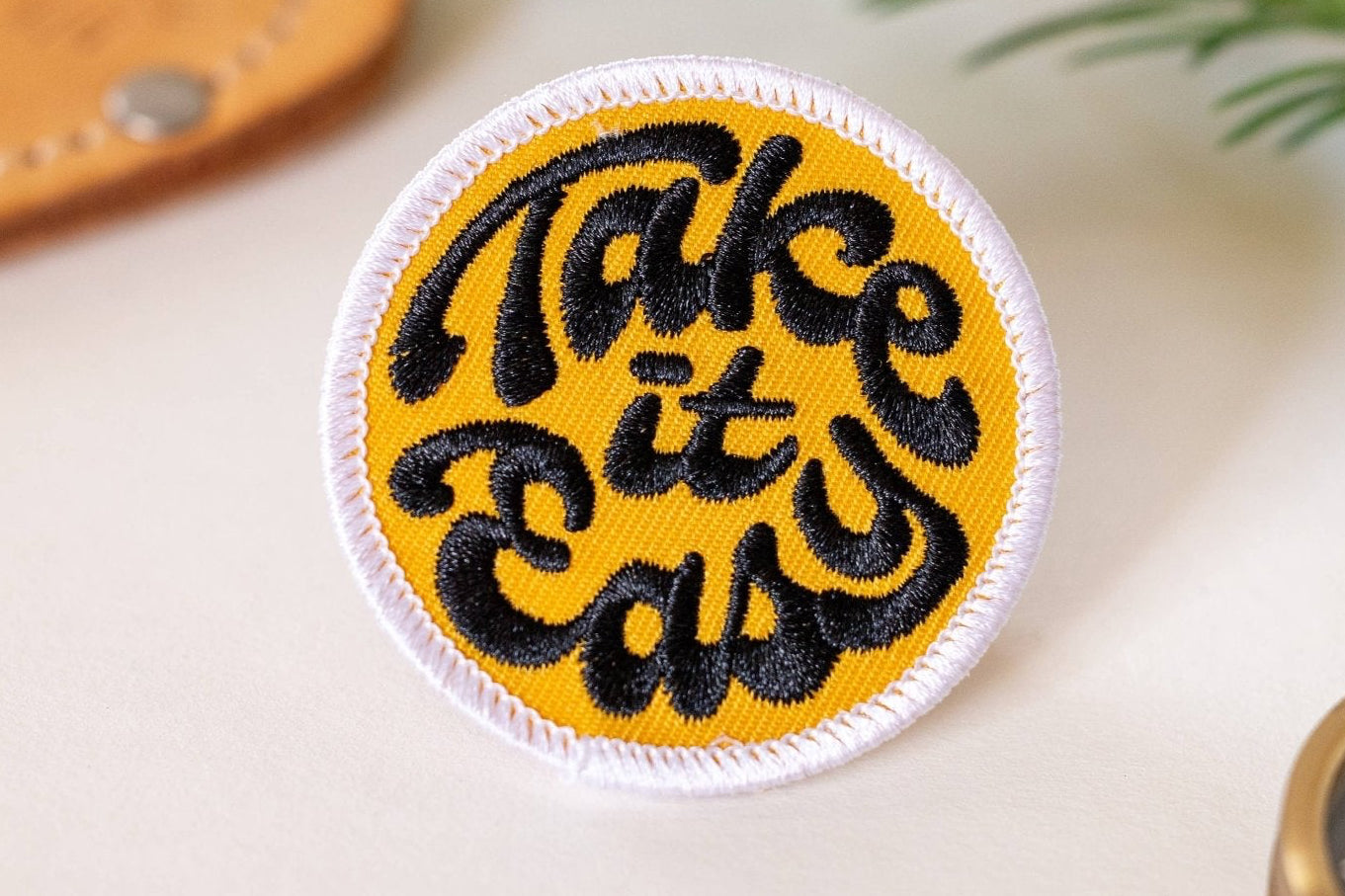 “Take it Easy” Embroidered Iron On Patch: Gold Background - Wander Together Outfitters