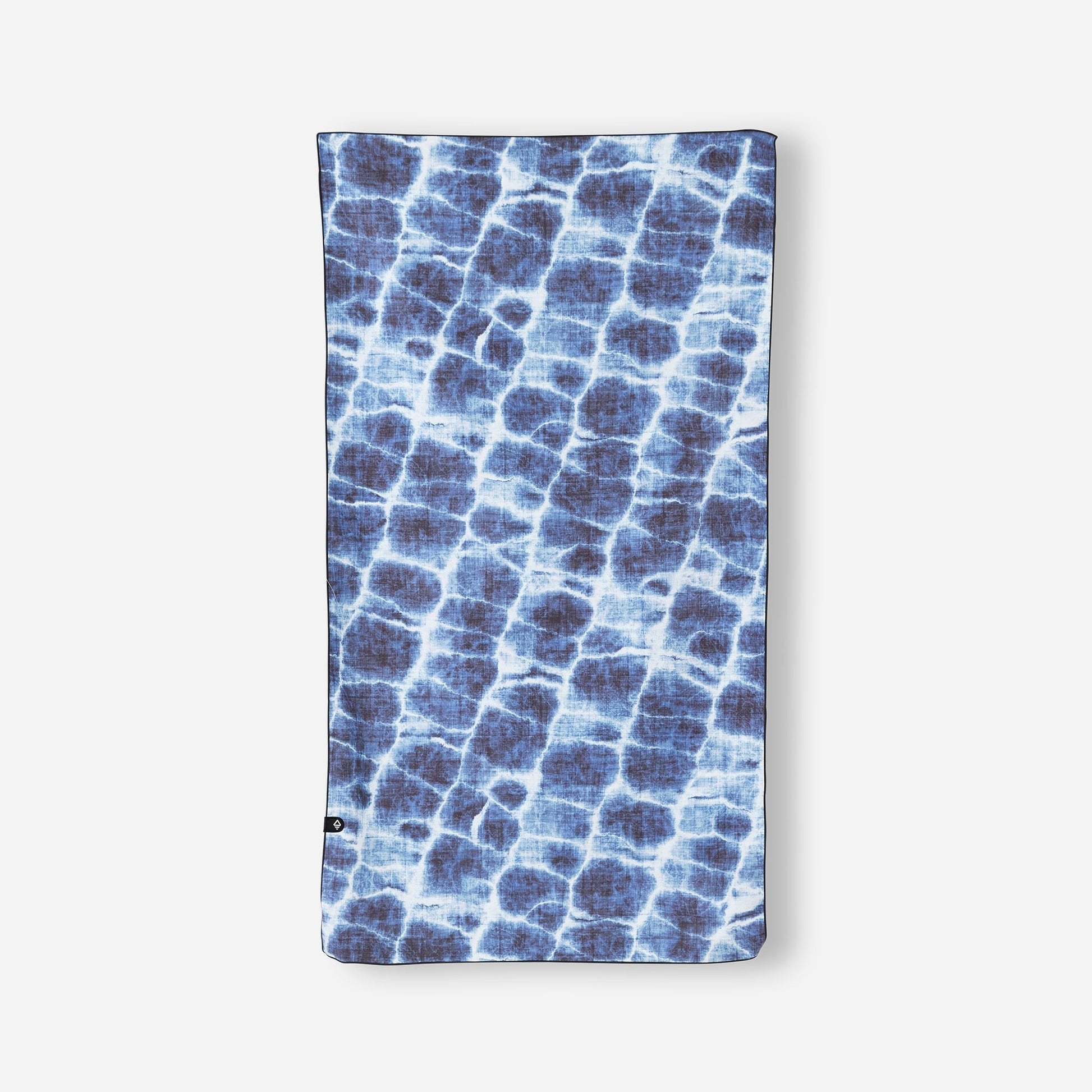 Blue patterned towel on a white background
